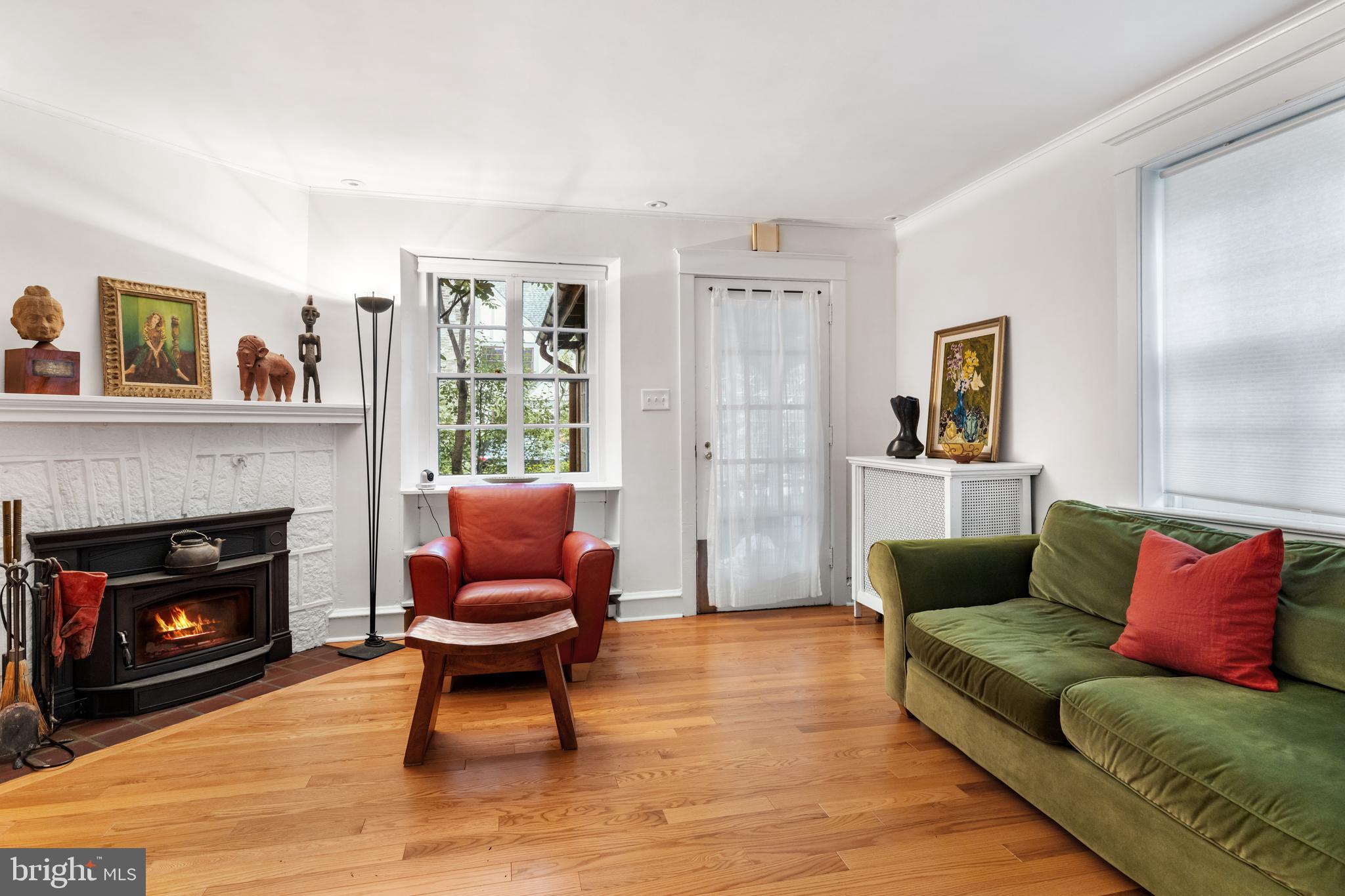 315 Wellesley Road Philadelphia, PA 19119 - Photo 9 of 32 a living room with furniture and a fireplace