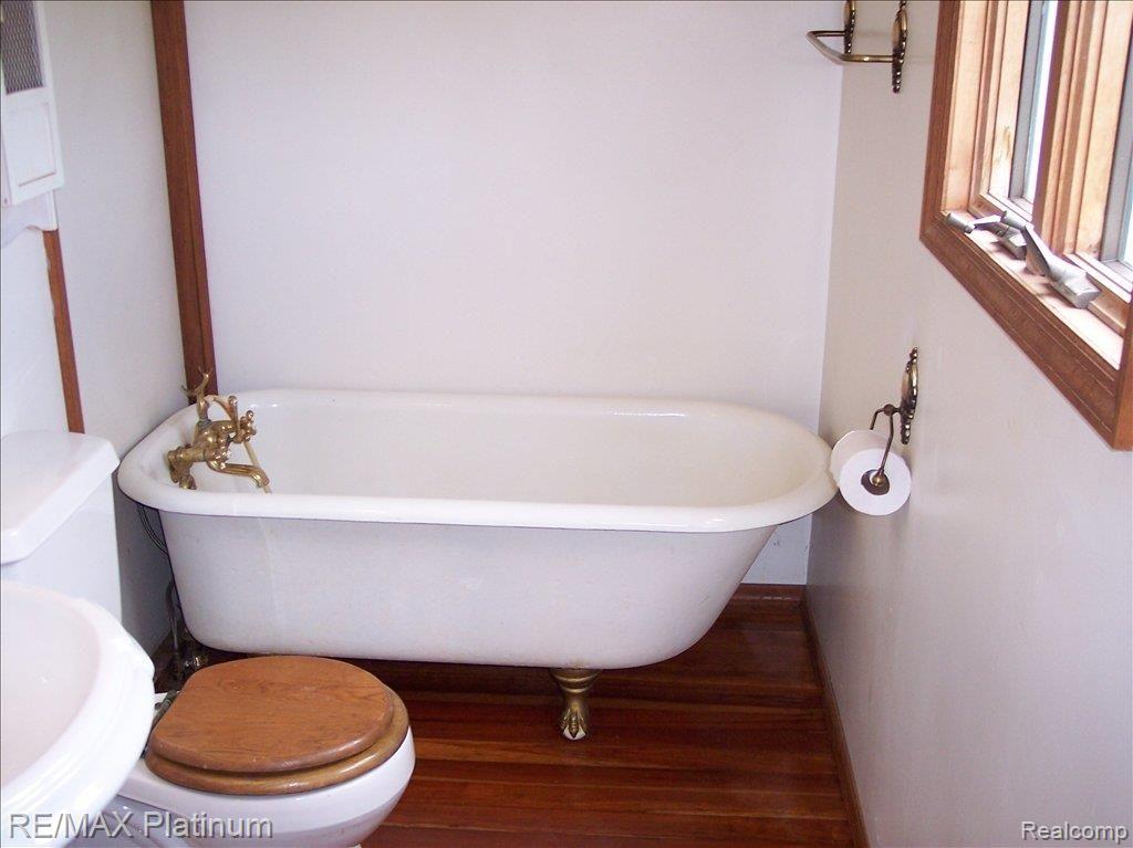 11259 North Owosso Road Fowlerville, MI 48836 - Photo 16 of 25 ANTIQUE CLAWFOOT TUB