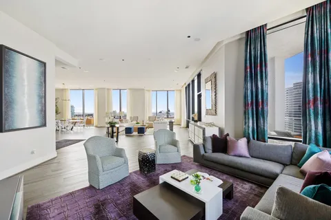 a kitchen with granite countertop a sink and stainless steel appliances