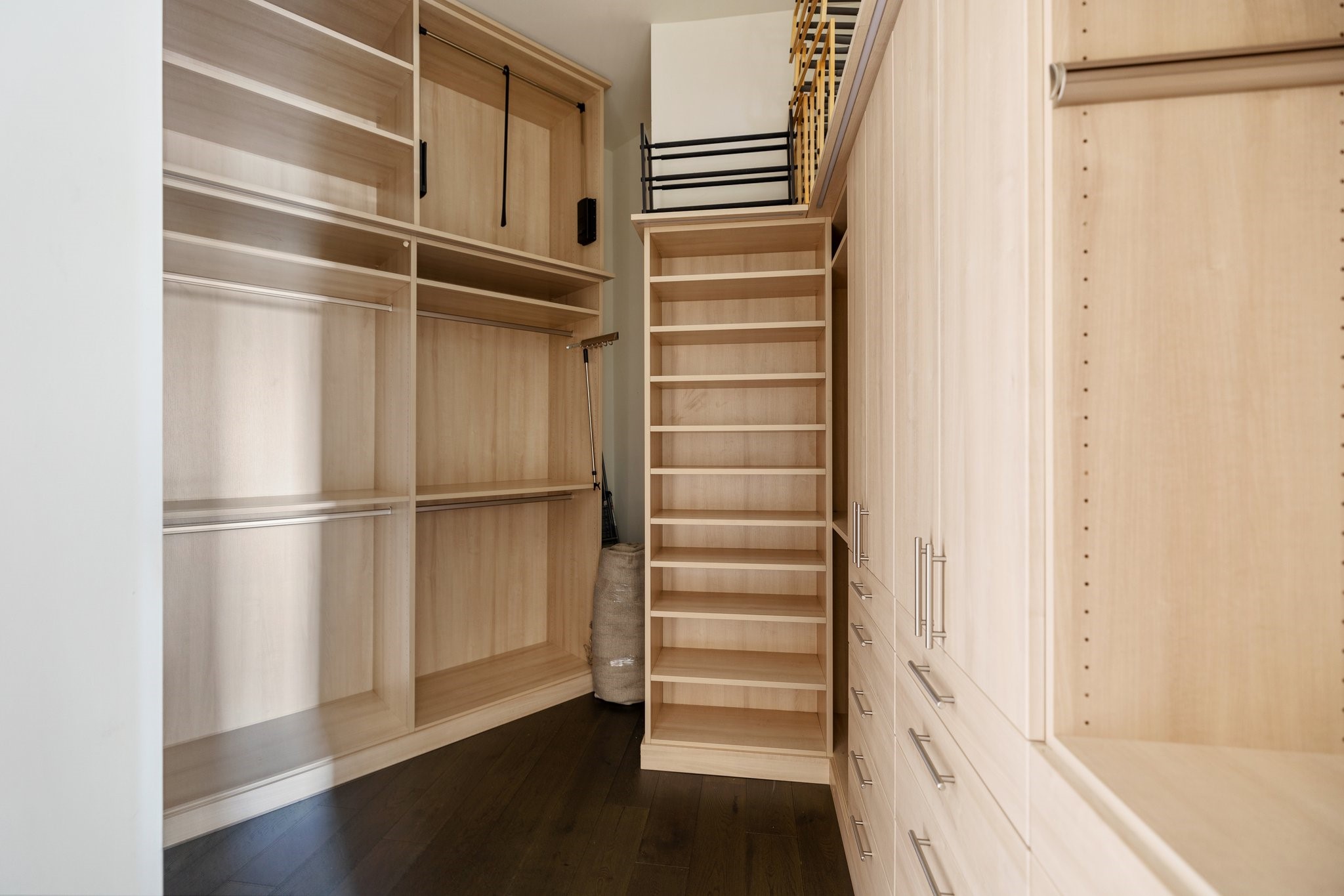 1409 Post Oak Boulevard, Unit 2702 Houston, TX 77056 - Photo 19 of 43 a view of walk in closet with empty racks