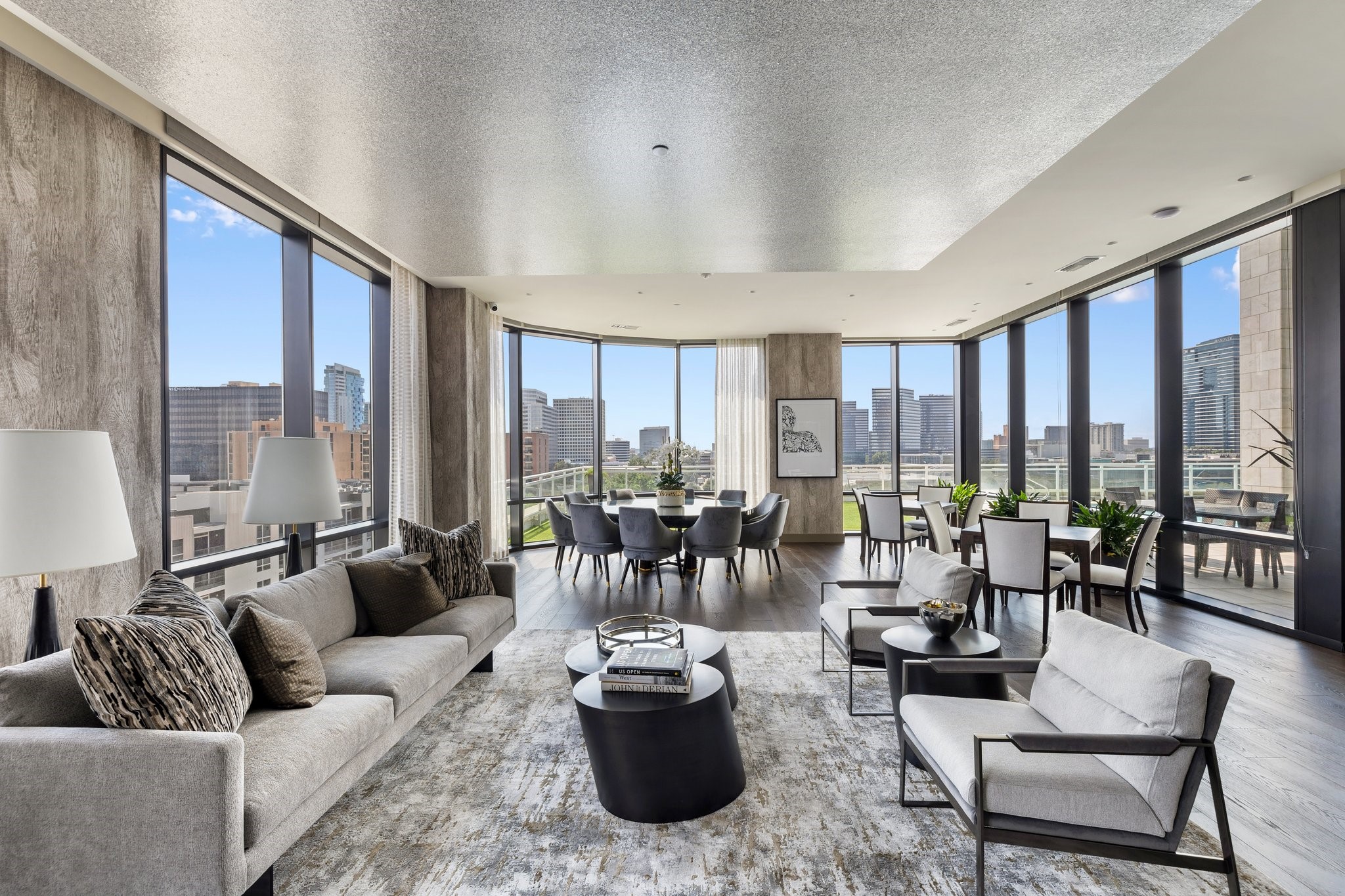 1409 Post Oak Boulevard, Unit 2702 Houston, TX 77056 - Photo 40 of 43 a living room with furniture and floor to ceiling windows
