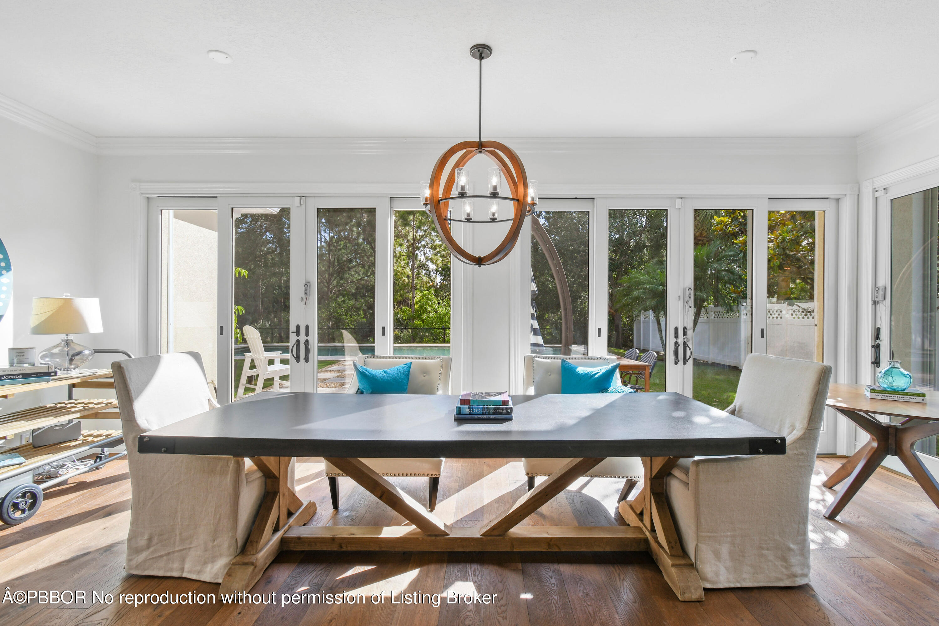 139 Florence Drive Jupiter, FL 33458 - Photo 11 of 33 a view of a dining room with furniture window and outside view