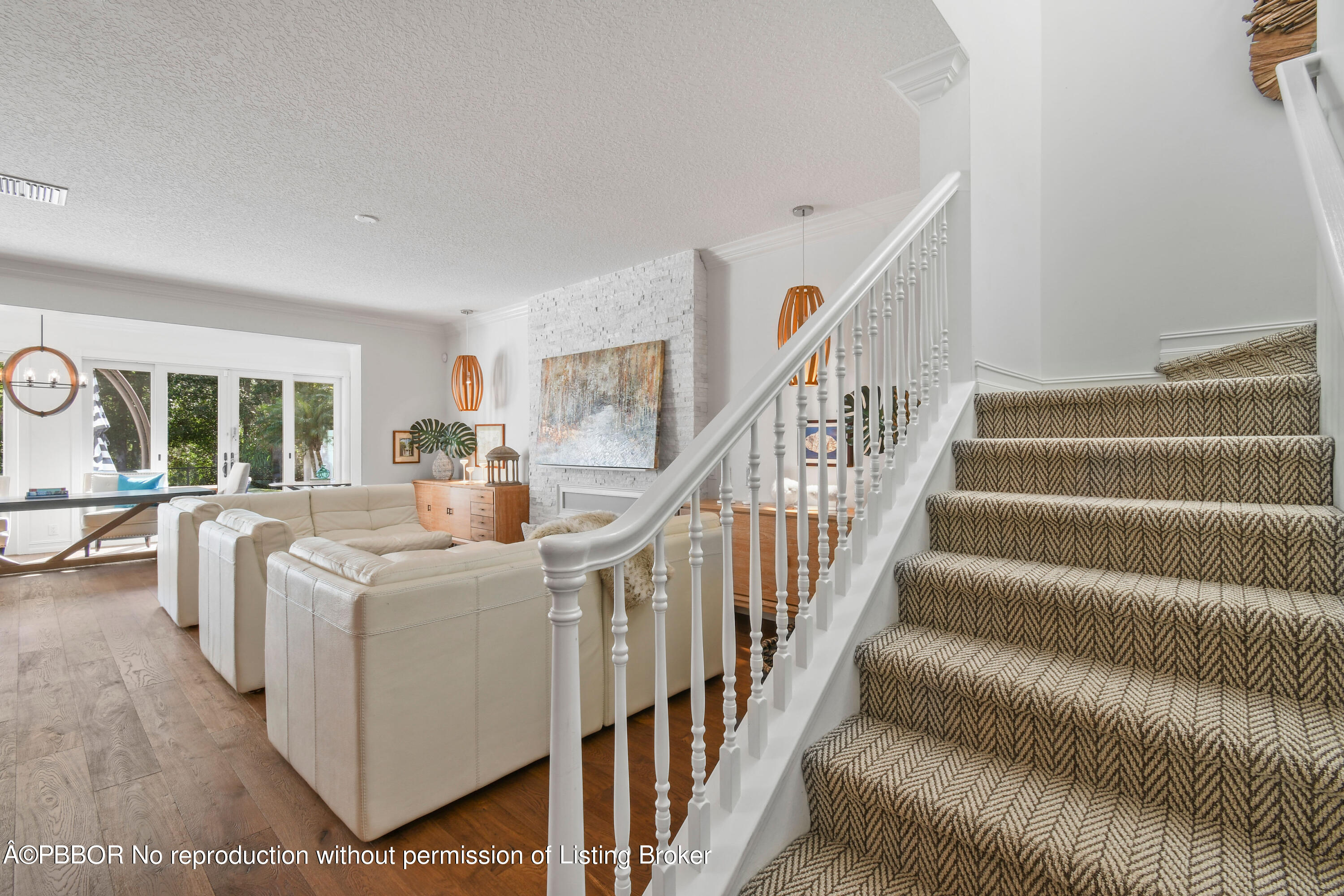 139 Florence Drive Jupiter, FL 33458 - Photo 18 of 33 a view of entryway and hall with wooden floor