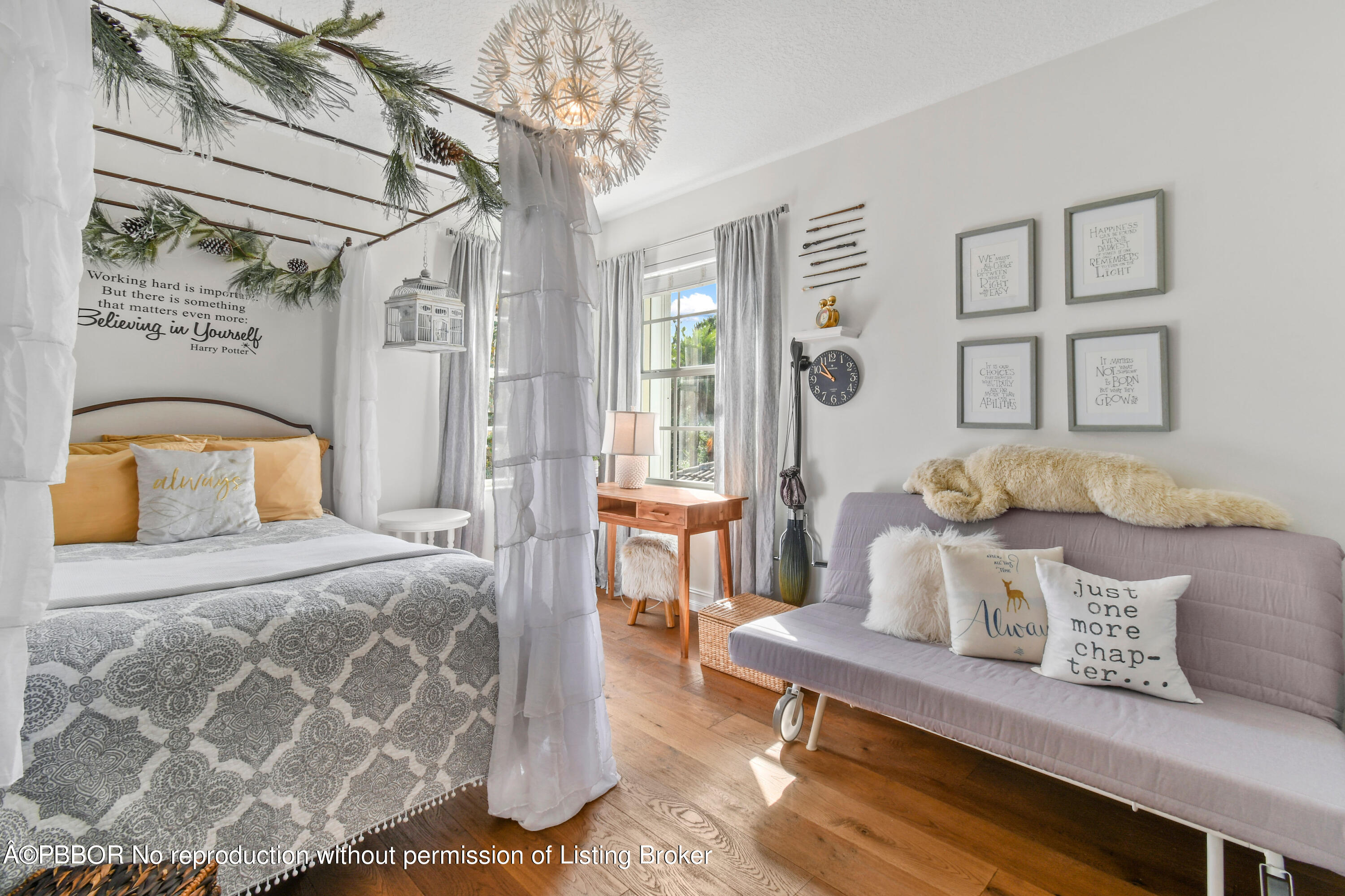 139 Florence Drive Jupiter, FL 33458 - Photo 19 of 33 a bedroom with a bed and wooden floor