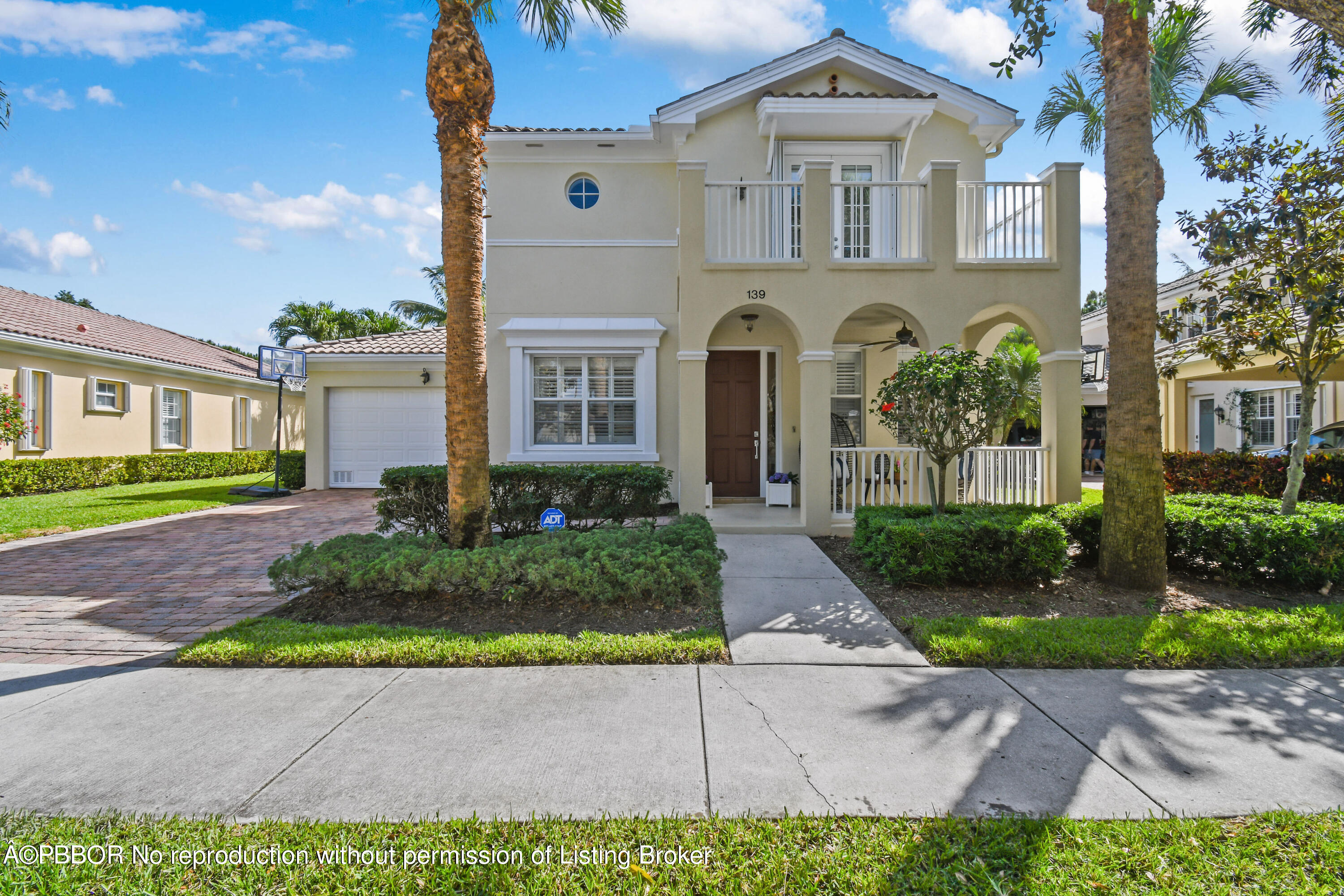 139 Florence Drive Jupiter, FL 33458 - Photo 2 of 33 front view of a house with a yard