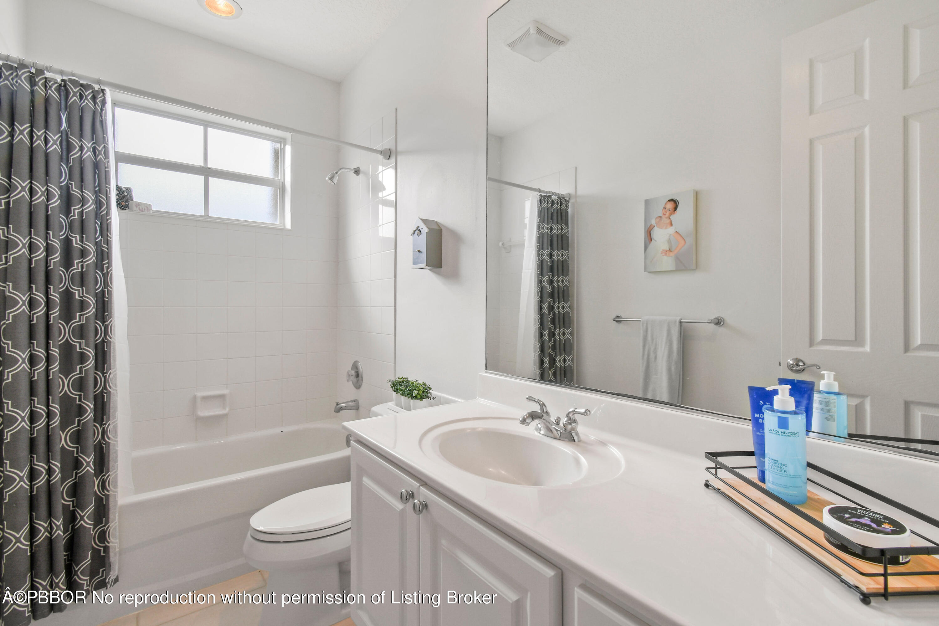 139 Florence Drive Jupiter, FL 33458 - Photo 22 of 33 a bathroom with a sink toilet tub and shower
