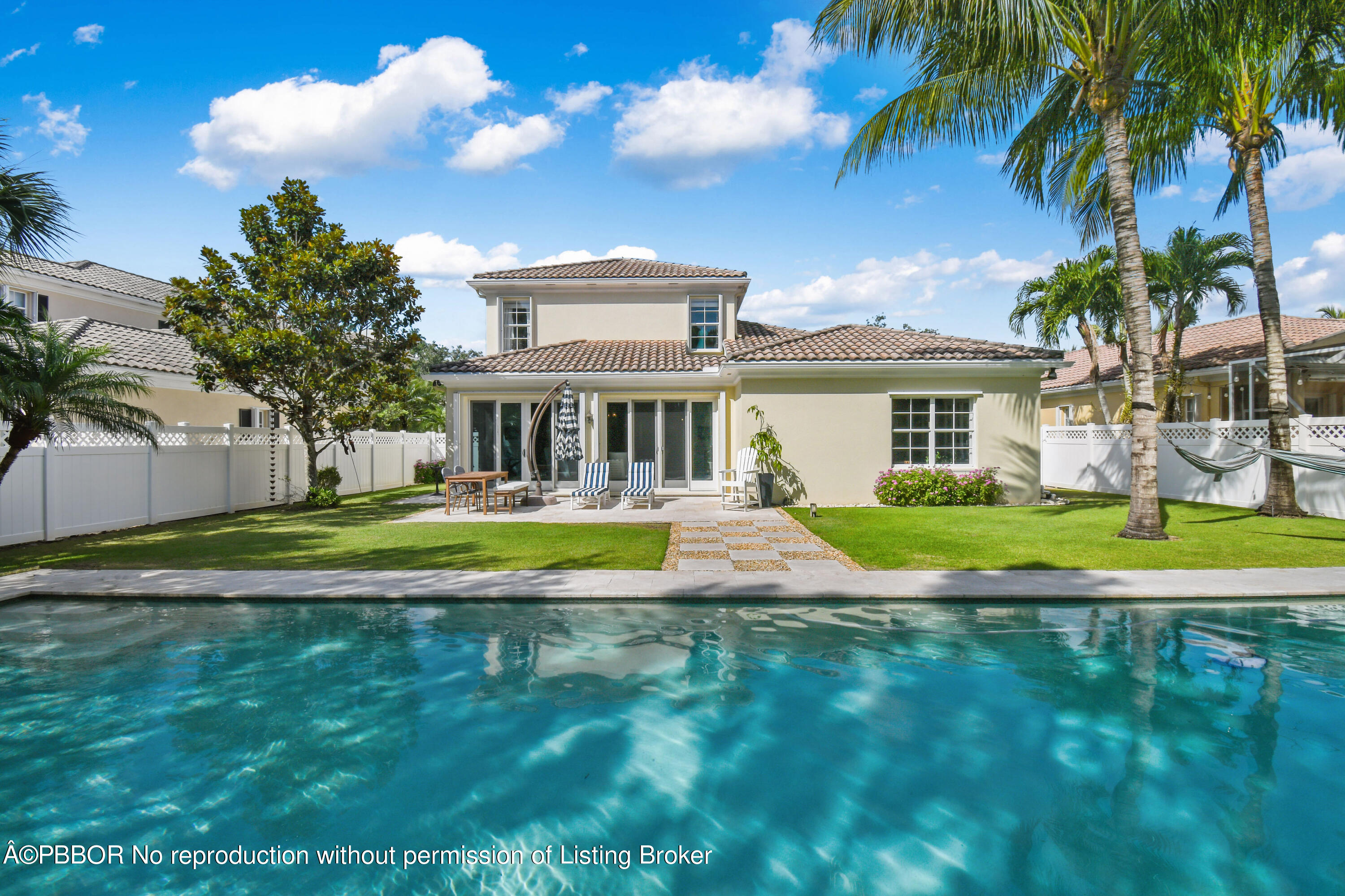 139 Florence Drive Jupiter, FL 33458 - Photo 28 of 33 a view of pool with garden and trees