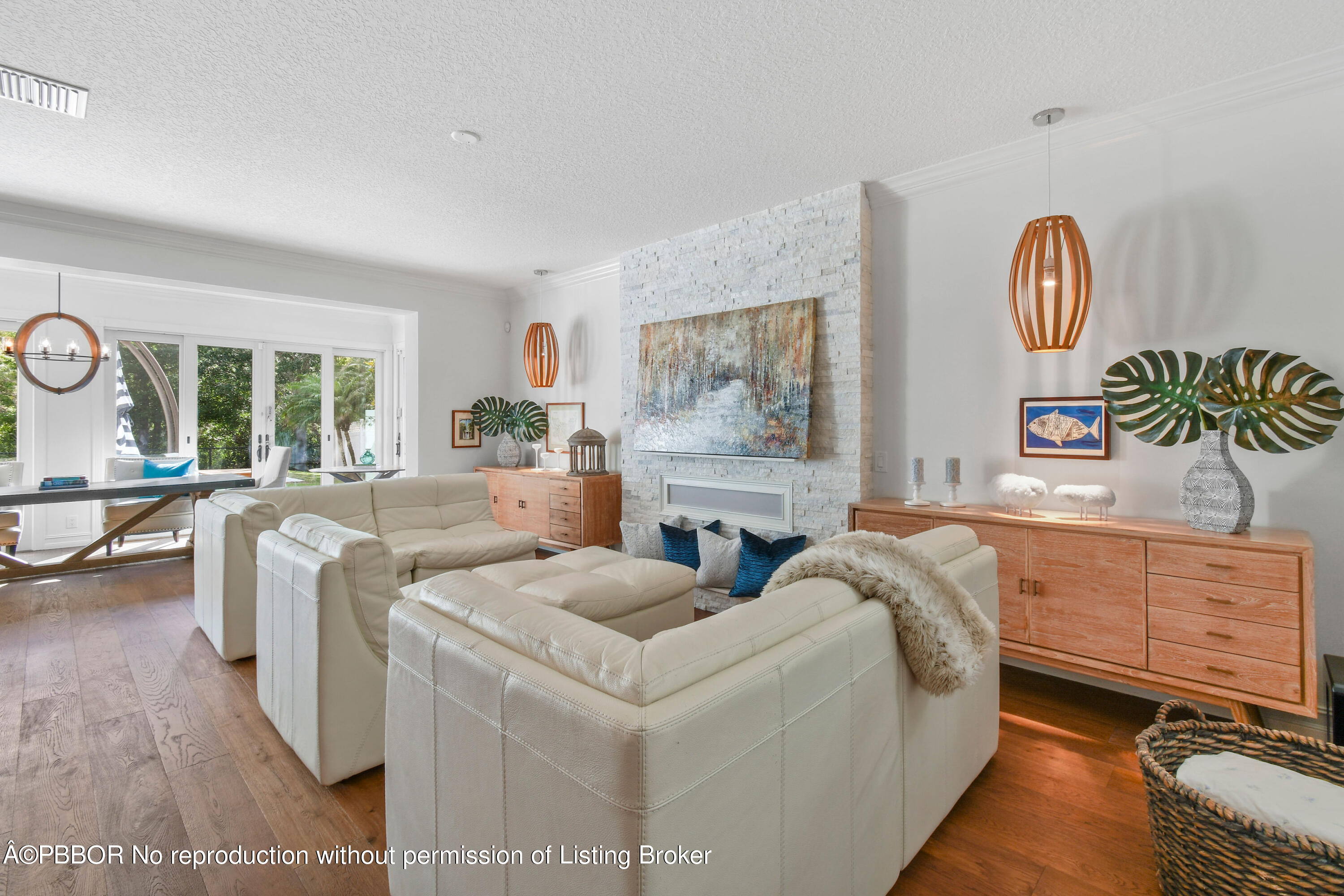 139 Florence Drive Jupiter, FL 33458 - Photo 7 of 33 a living room with furniture a couch and dresser