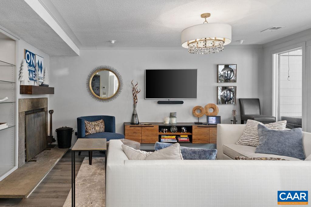 113 Eagles Court Roseland, VA 22967 - Photo 13 of 23 a living room with furniture and a flat screen tv