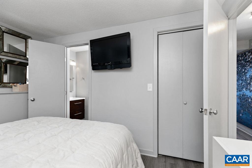 113 Eagles Court Roseland, VA 22967 - Photo 15 of 23 a bedroom with a bed and a television