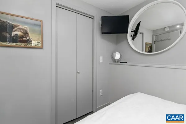 a bathroom with a sink and mirror