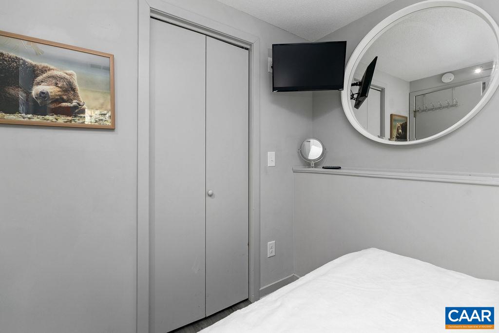 113 Eagles Court Roseland, VA 22967 - Photo 18 of 23 a bathroom with a sink and mirror