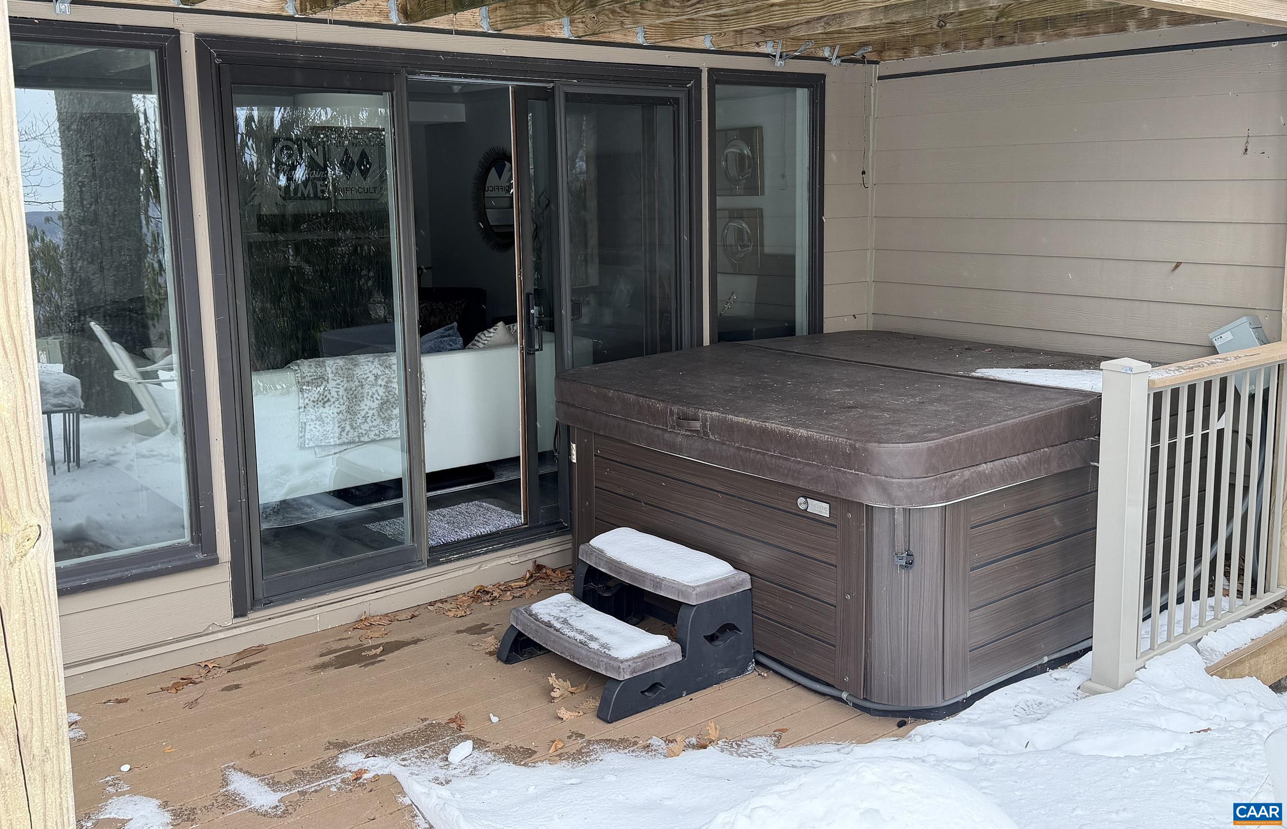 113 Eagles Court Roseland, VA 22967 - Photo 21 of 23 a room with a walk in closet and glass door
