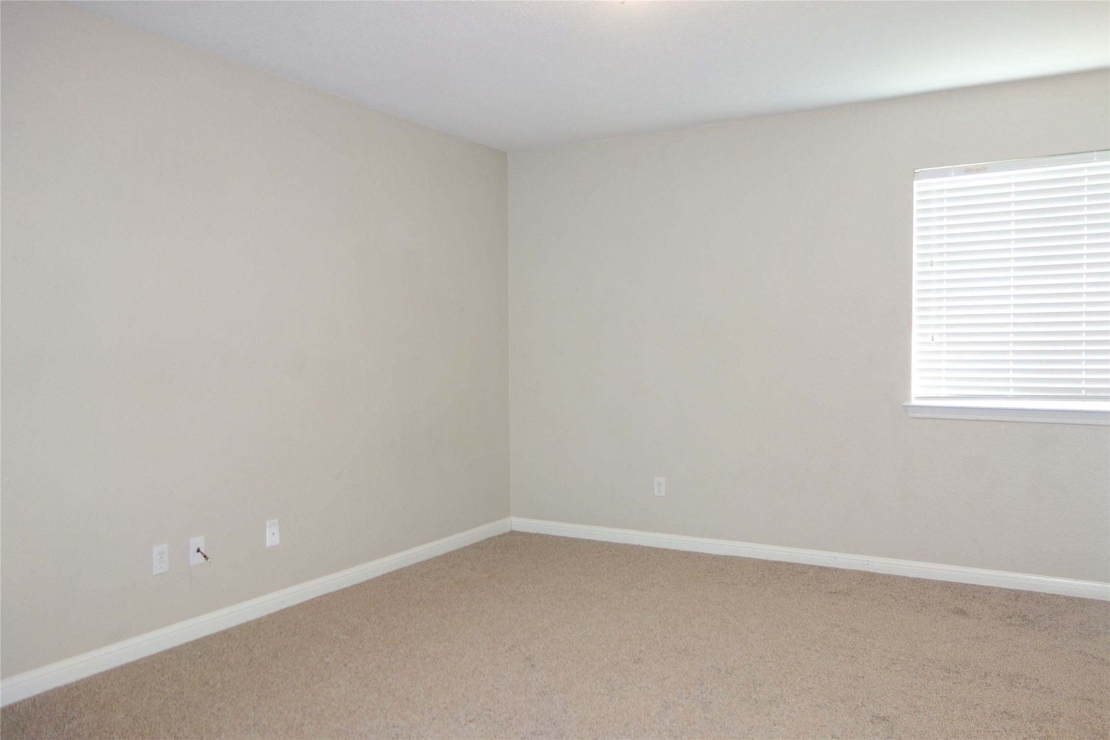 108 Lavaca Loop Hutto, TX 78634 - Photo 25 of 39 an empty room with a window