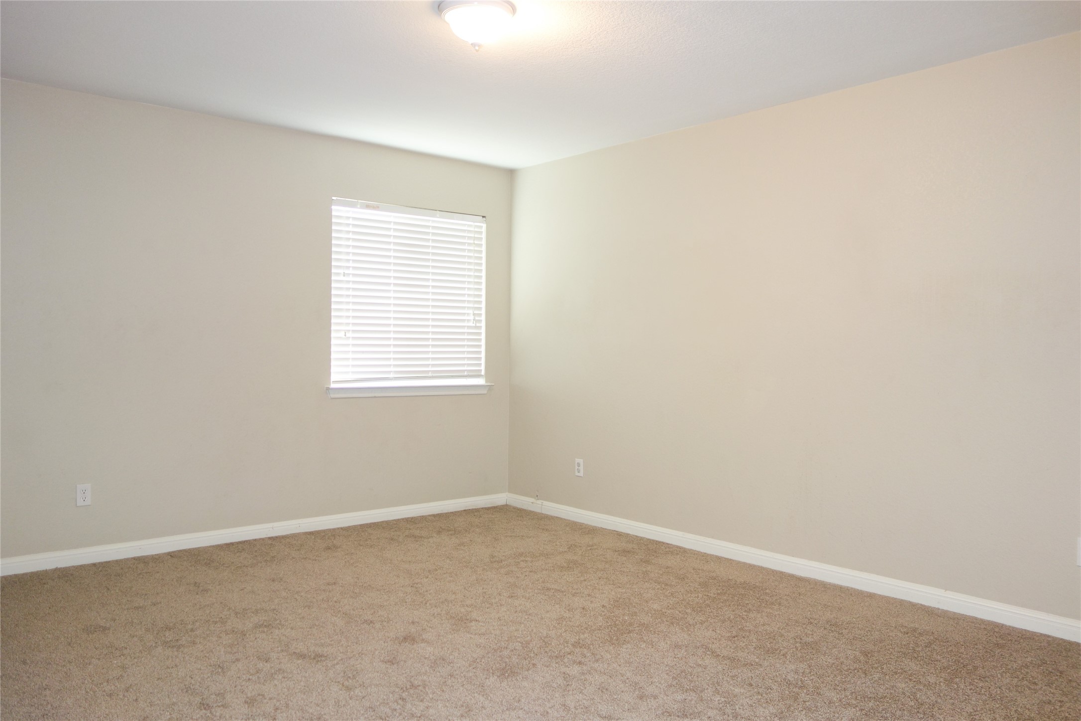 108 Lavaca Loop Hutto, TX 78634 - Photo 26 of 39 an empty room with a window