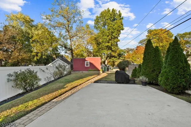 a view of swimming pool with a yard