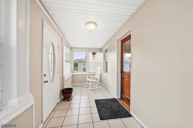 a living room with a rug