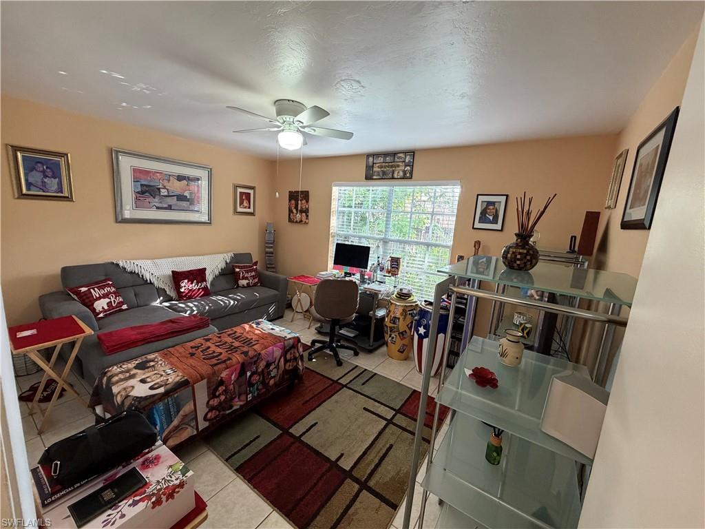 5352 16th Place Southwest, Unit G2 Naples, FL 34116 - Photo 13 of 17 a living room with furniture