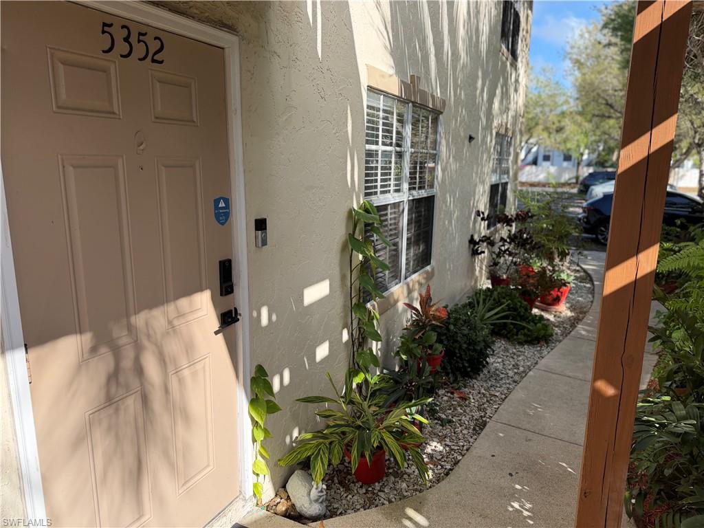 5352 16th Place Southwest, Unit G2 Naples, FL 34116 - Photo 2 of 17 a picture of flowers
