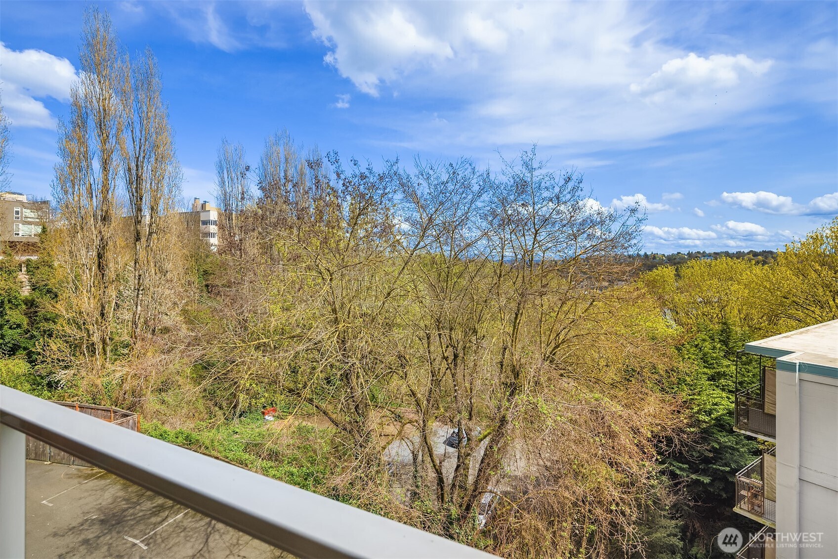 1730 Taylor Avenue North, Unit 409 Seattle, WA 98109 - Photo 17 of 22 a view of a yard with an outdoor space