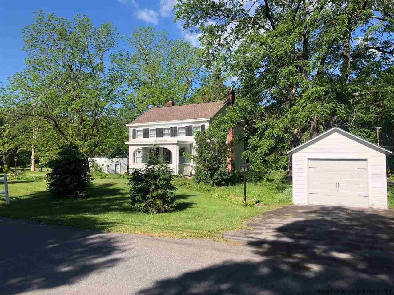 8 George Sickle Road, Unit 8 Saugerties, NY 12477 - Photo 11 of 24 a front view of a house with a yard and green space