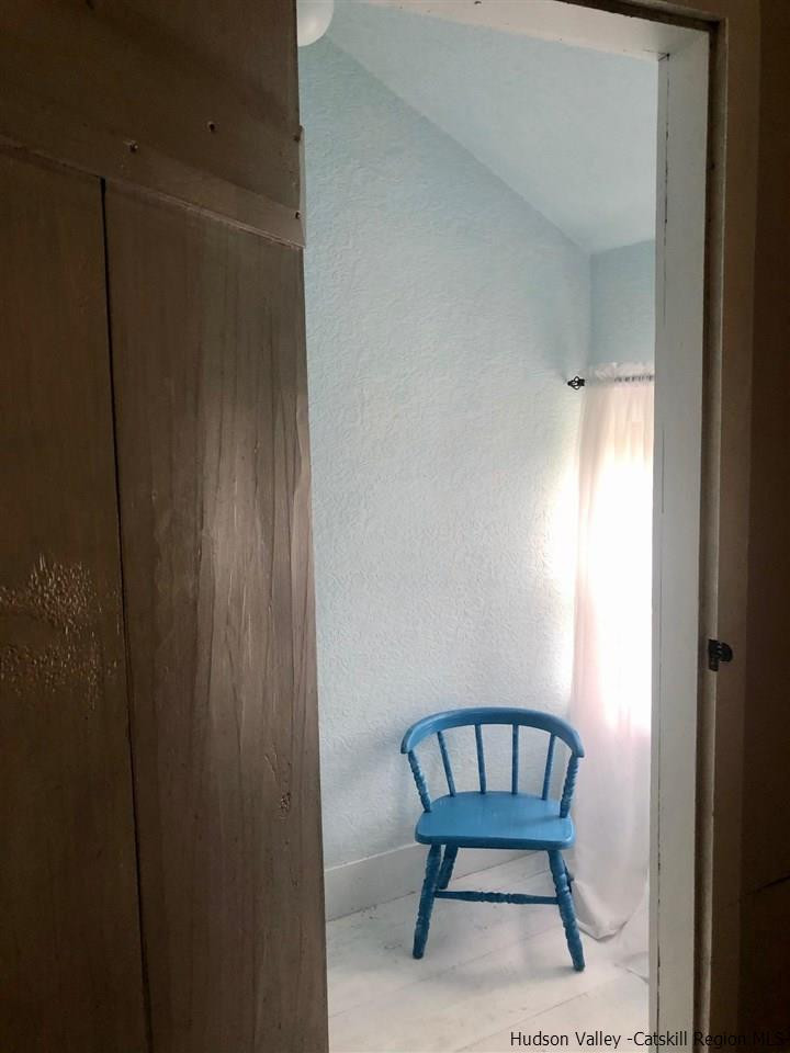 8 George Sickle Road, Unit 8 Saugerties, NY 12477 - Photo 12 of 24 a view of a bathroom with a table and chair