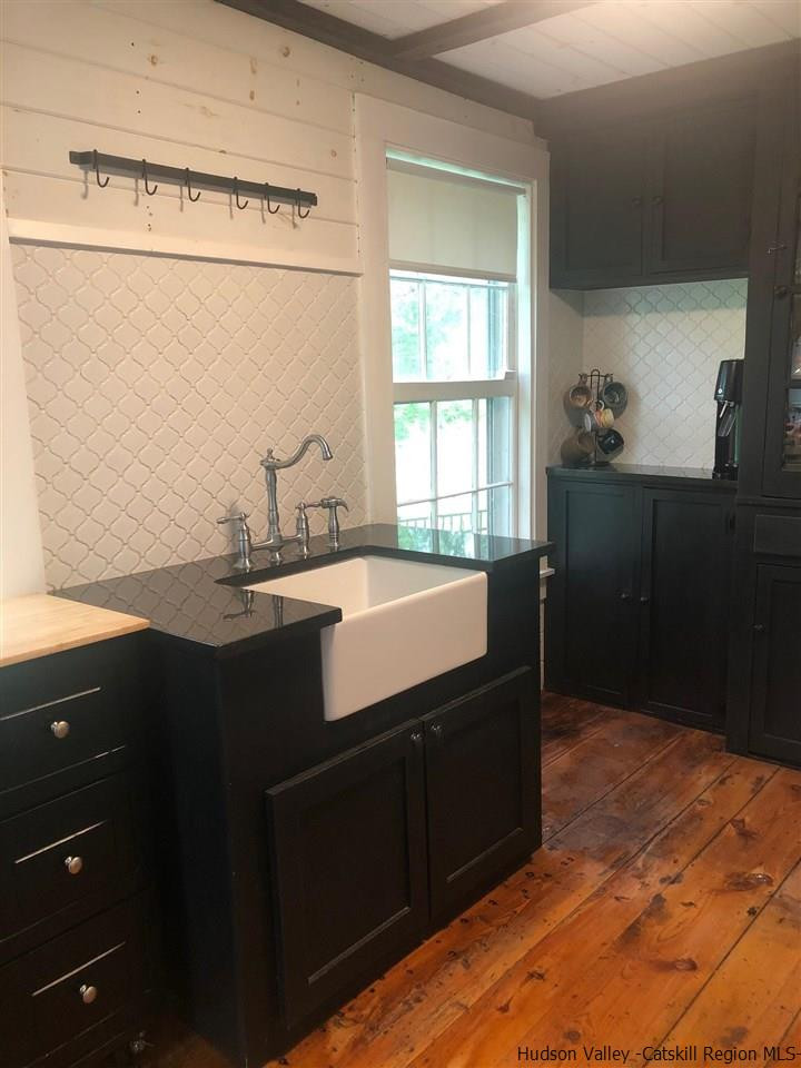 8 George Sickle Road, Unit 8 Saugerties, NY 12477 - Photo 16 of 24 a kitchen with a sink and cabinets