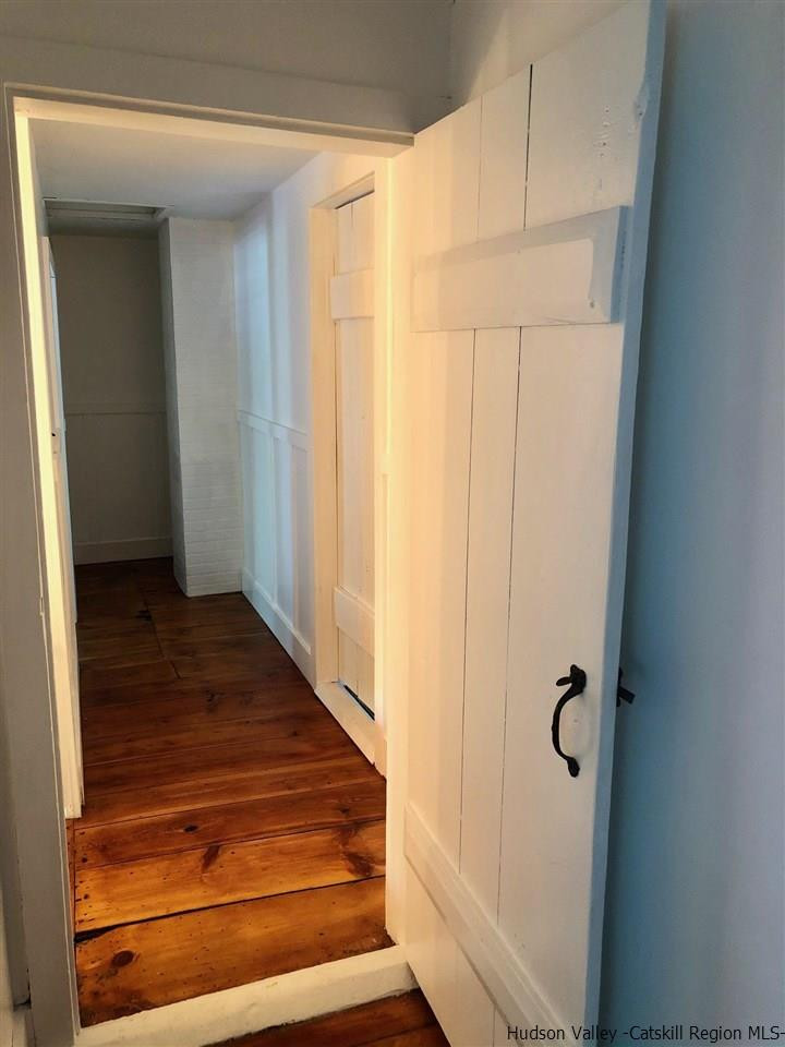 8 George Sickle Road, Unit 8 Saugerties, NY 12477 - Photo 20 of 24 a view of a hallway with wooden floor and entryway