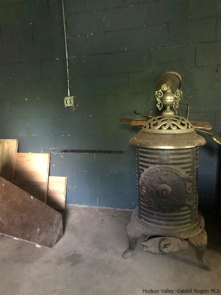 8 George Sickle Road, Unit 8 Saugerties, NY 12477 - Photo 23 of 24 a close view of a fireplace in room