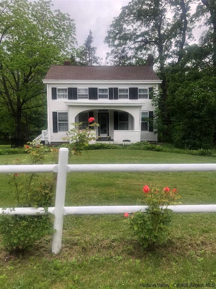 8 George Sickle Road, Unit 8 Saugerties, NY 12477 - Photo 3 of 24 a front view of a house with a yard