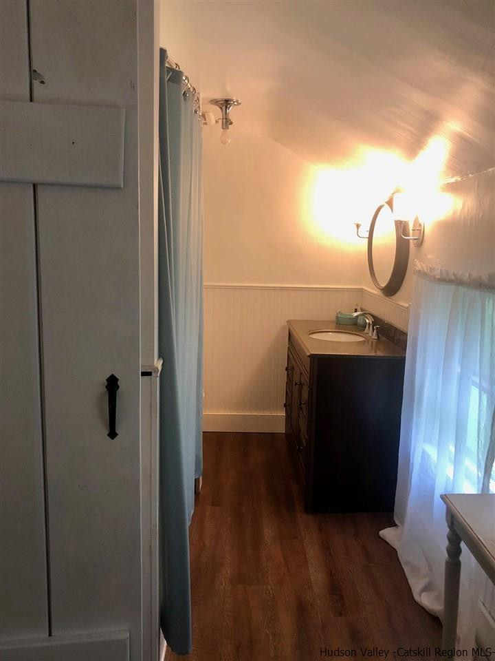 8 George Sickle Road, Unit 8 Saugerties, NY 12477 - Photo 10 of 24 a bathroom with a sink and mirror