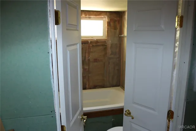 a bathroom with a bathtub