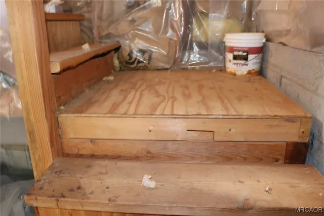 a view of kitchen with wooden floor