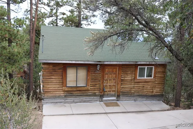 a view of a room with water heater and storage
