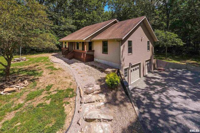 17937 Caplinger Pond Road Marion, IL 62959 - Photo 1 of 43 a view of a house with a yard