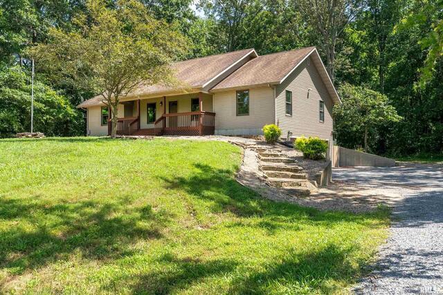17937 Caplinger Pond Road Marion, IL 62959 - Photo 2 of 43 a front view of a house with a yard