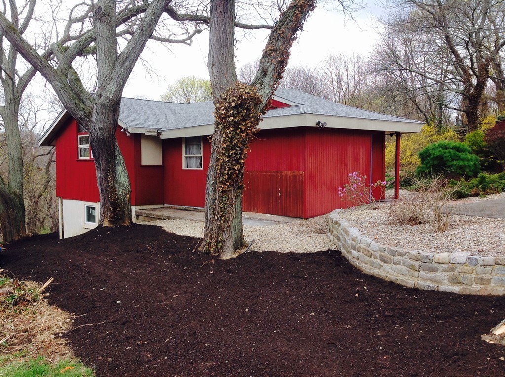 25 Haley Road Marblehead, MA 01945 - Photo 11 of 11 a house with trees in front of it