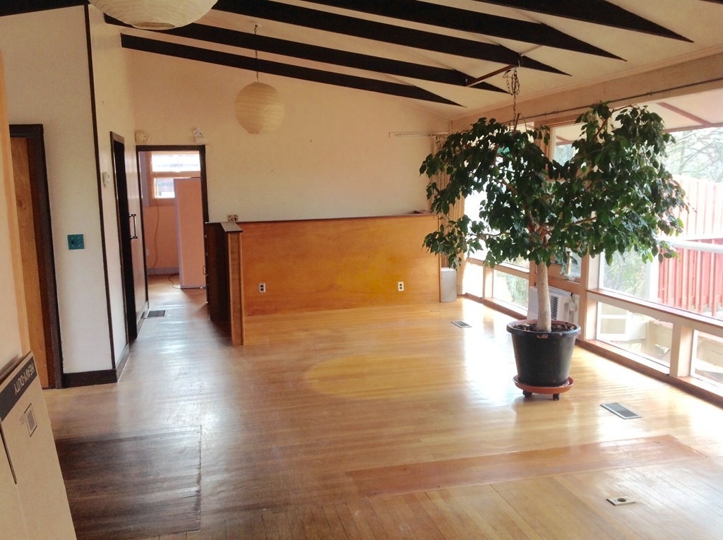 25 Haley Road Marblehead, MA 01945 - Photo 6 of 11 a view of a hallway with wooden floor and a potted plant