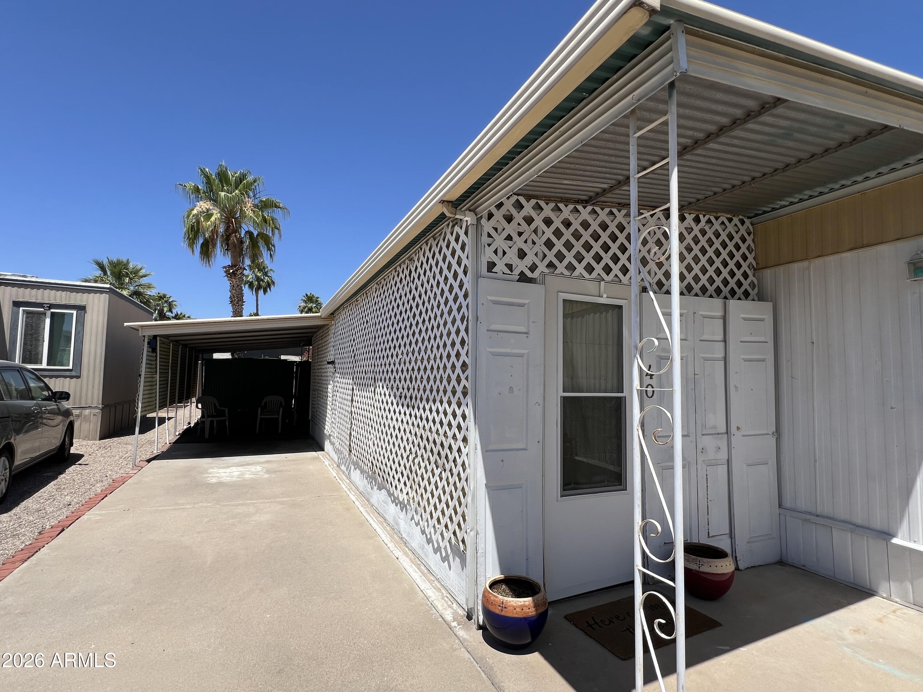 19225 North Cave Creek Road, Unit 40 Phoenix, AZ 85024 - Photo 3 of 21 a view of a porch