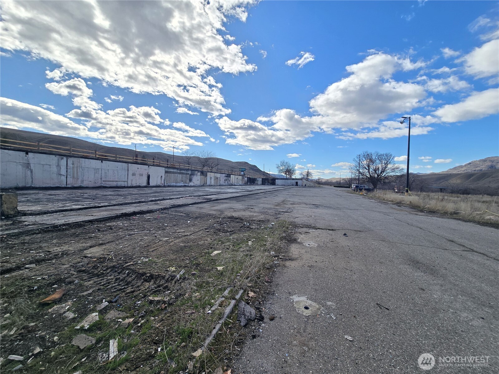11 Apple Way Road Okanogan, WA 98840 - Photo 3 of 17 a view of a backyard of the house