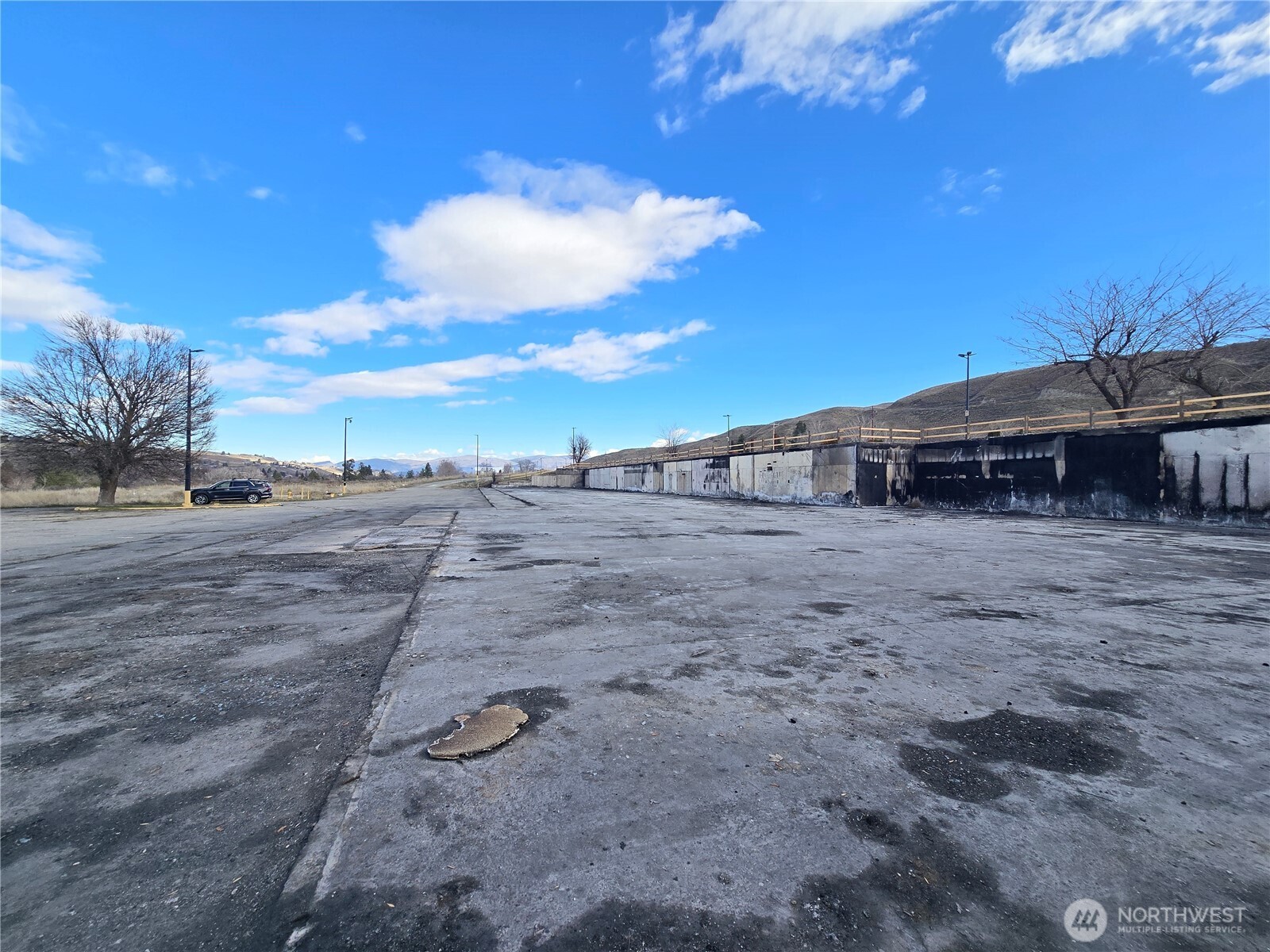 11 Apple Way Road Okanogan, WA 98840 - Photo 6 of 17 a view of a house with a backyard