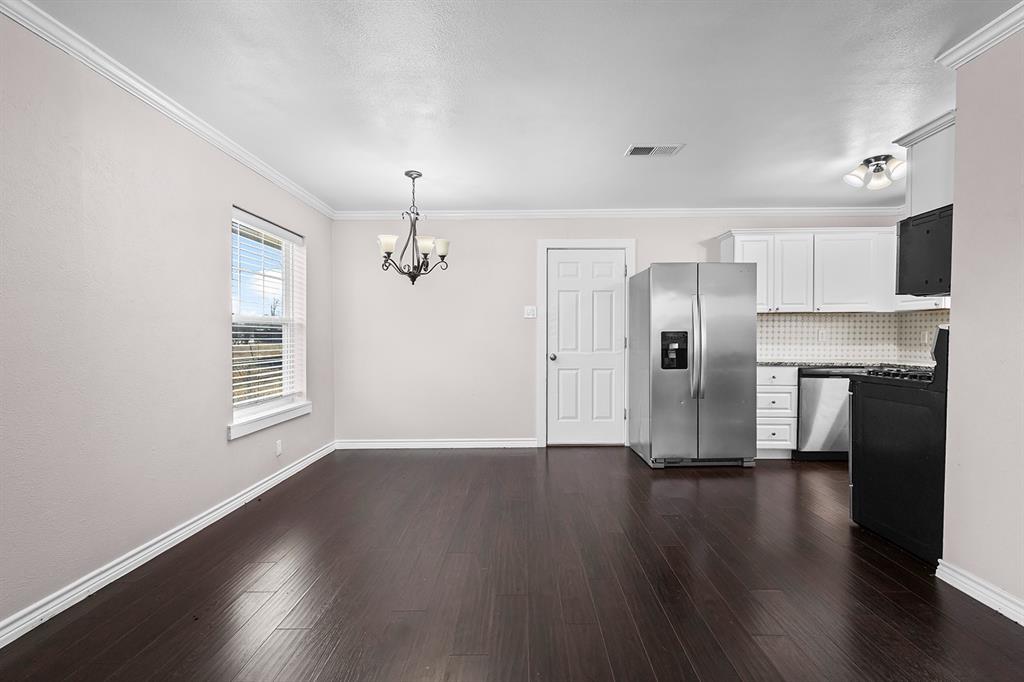 1135 Reed Circle Howe, TX 75459 - Photo 9 of 28 a view of empty room with wooden floor and fireplace