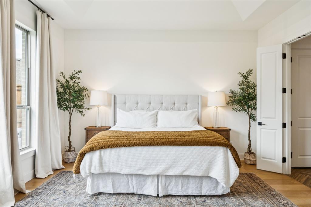 2429 Gallant Fox Road Celina, TX 75009 - Photo 16 of 39 a bedroom with a bed and a window