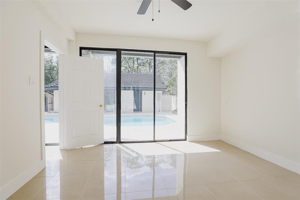 5614 Indian Circle Houston, TX 77056 - Photo 12 of 28 a view of a livingroom with a sliding door