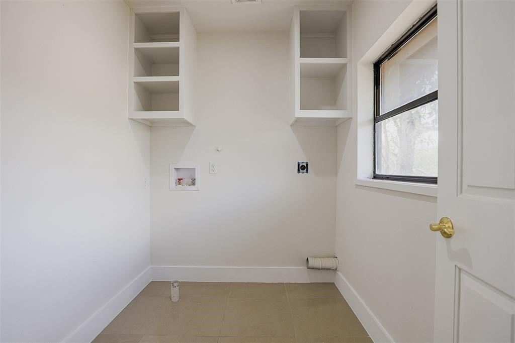 5614 Indian Circle Houston, TX 77056 - Photo 22 of 28 a view of small space with racks on the wall