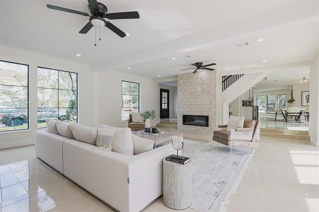 5614 Indian Circle Houston, TX 77056 - Photo 3 of 28 a living room with furniture and a fireplace