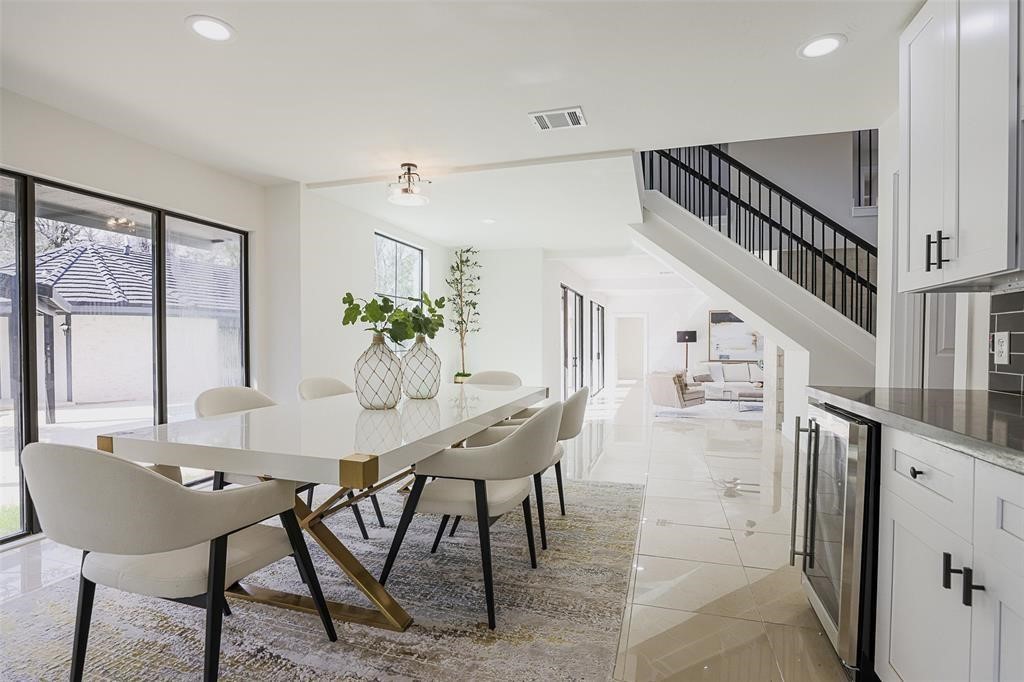 5614 Indian Circle Houston, TX 77056 - Photo 6 of 28 a view of a dining room with furniture window and wooden floor