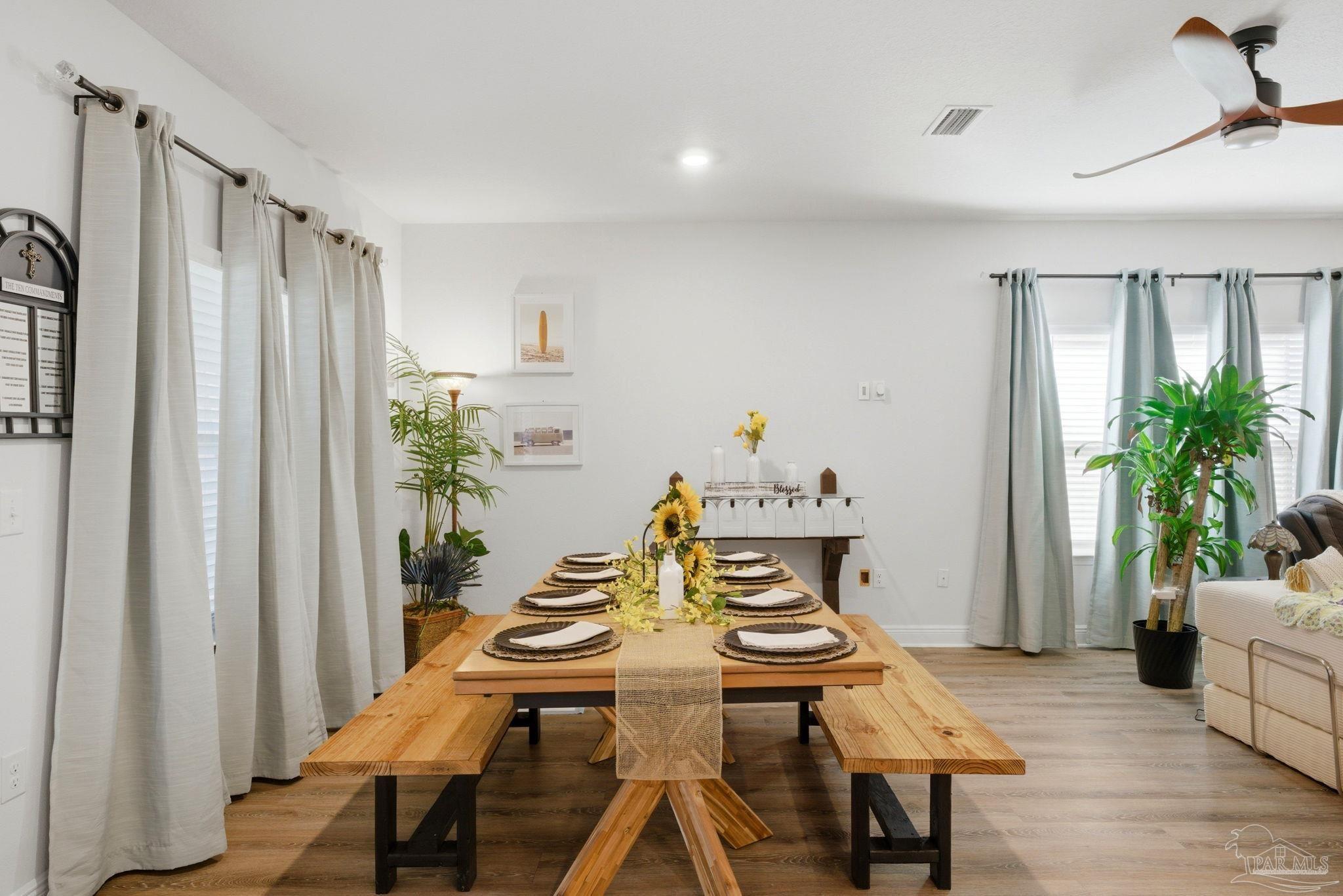 7829 Burnside Loop Pensacola, FL 32526 - Photo 11 of 34 a view of a dining room with furniture and a window