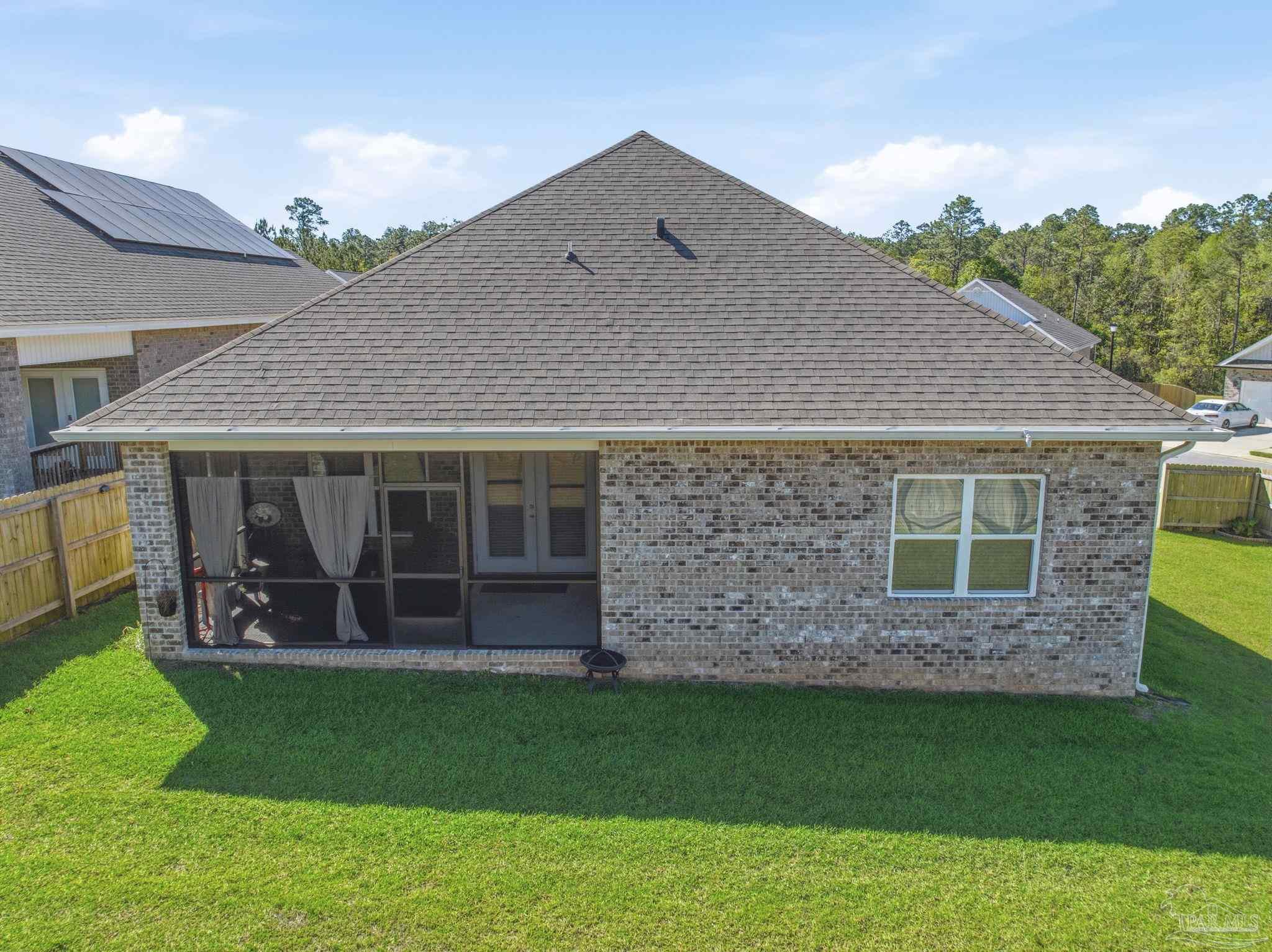 7829 Burnside Loop Pensacola, FL 32526 - Photo 31 of 34 a front view of a house with garden