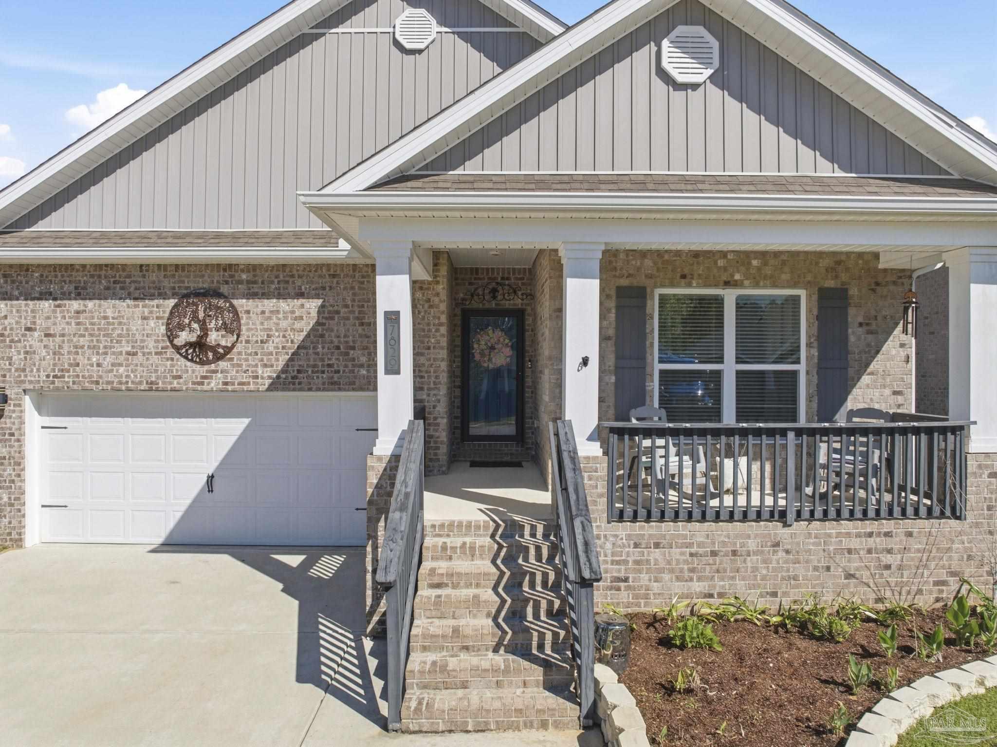 7829 Burnside Loop Pensacola, FL 32526 - Photo 5 of 34 a front view of a house